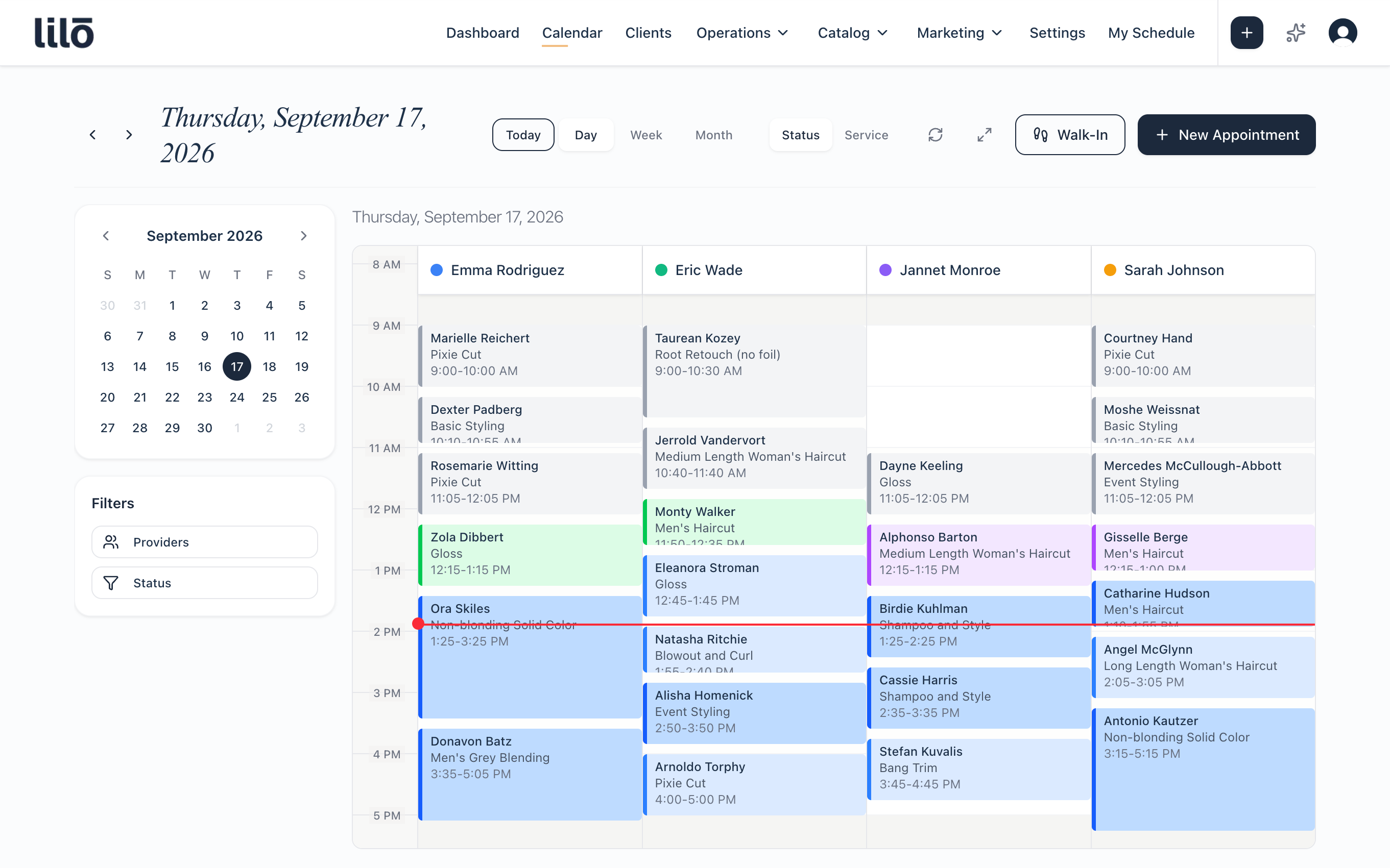 The Lilo dashboard on the Calendar tab: a day view with four providers in their own columns, a mini month calendar and provider and status filters down the left, and Walk-In and New Appointment in the header